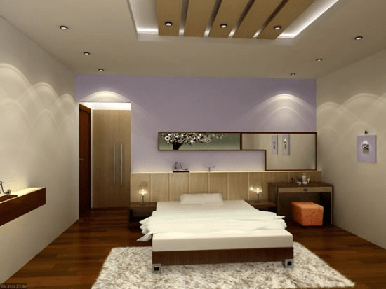 Không gian phòng ngủ vợ chồng hiện đại với mẫu trần giả gỗ. 